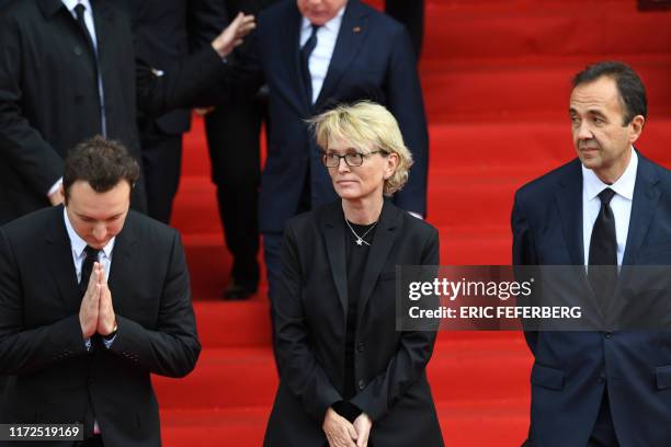 France's former President Jacques Chirac's daughter Claude Chirac , her son Martin Rey-Chirac and husband Frederic Salat-Baroux thank members of the...
