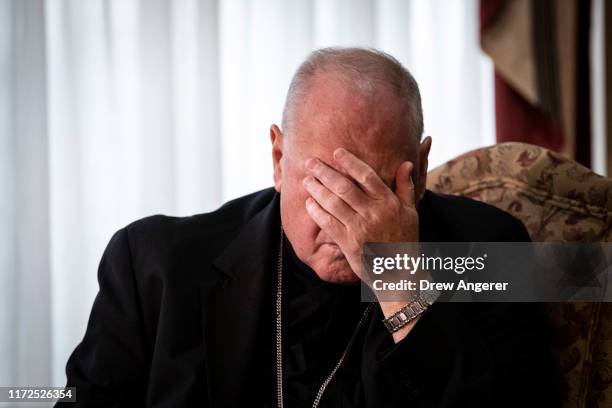 Cardinal Timothy Dolan, Archbishop of New York, attends a news conference regarding the response to sexual abuse of minors within the New York...