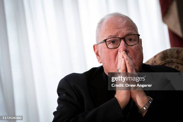 Cardinal Timothy Dolan, Archbishop of New York, attends a news conference regarding the response to sexual abuse of minors within the New York...