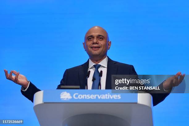 Britain's Chancellor of the Exchequer Sajid Javid delivers his keynote speech on the second day of the annual Conservative Party conference at the...