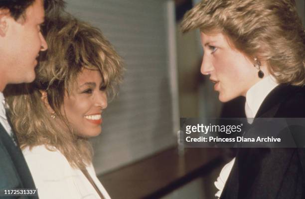Diana, Princess of Wales meets singers Paul Young and Tina Turner backstage at a Prince's Trust charity rock concert at Wembley, June 1986. Diana is...
