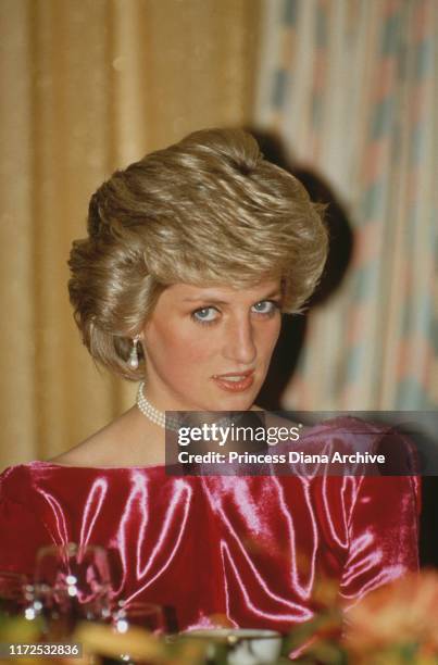 Diana, Princess of Wales wearing a pink evening gown by Catherine Walker to a dinner in Palm Beach, Florida, USA, November 1985.