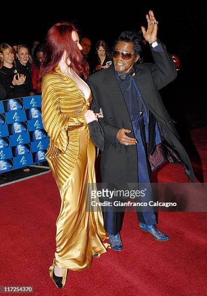 James Brown and wife Tomi Rae Hynie during UK Music Hall Of Fame 2006 - Arrivals at Alexandra Palace in London, Great Britain.