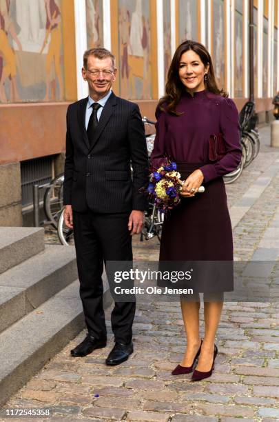 Crown Princess Mary of Denmark is welcomed by Thomas Roerdam, President of the Supreme Court, at Thorvaldsens Museum at the Parliament complex, where...