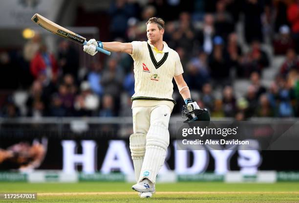 Steve Smith of Australia celebrates reaching his double century during Day Two of the 4th Specsavers Ashes Test between England and Australia at Old...