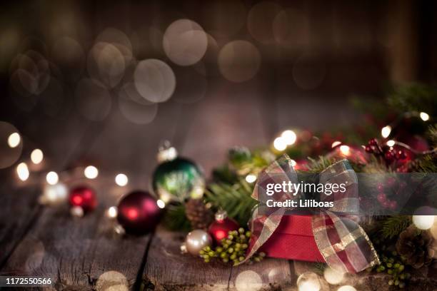 christmas gift on old wood background - country christmas stock pictures, royalty-free photos & images