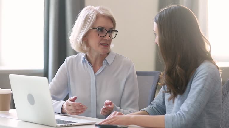 https://media.gettyimages.com/id/1172551575/video/helpful-old-female-teacher-mentor-teach-intern-student-with-laptop.jpg?b=1&s=640x640&k=20&c=ylK3CyMb0aelZcY279zs2J1648rKb8suDTplpP7mTg4=
