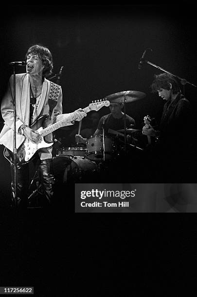 Singer-frontman Mick Jagger, drummer Charlie Watts and guitarist Keith Richards of The Rolling Stones perform at the Fabulous Fox Theater on June 12,...