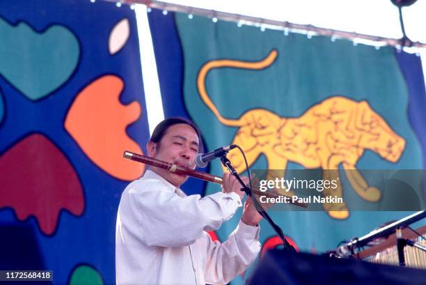 Guo Yue of the band Trisan performs on stage at the World Music Theater in Tinley Park, Illinois, September 3, 1993.