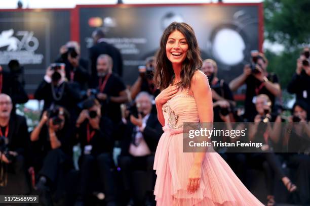 Alessandra Mastronardi walks the red carpet ahead of the "Gloria Mundi" screening during the 76th Venice Film Festival at Sala Grande on September...