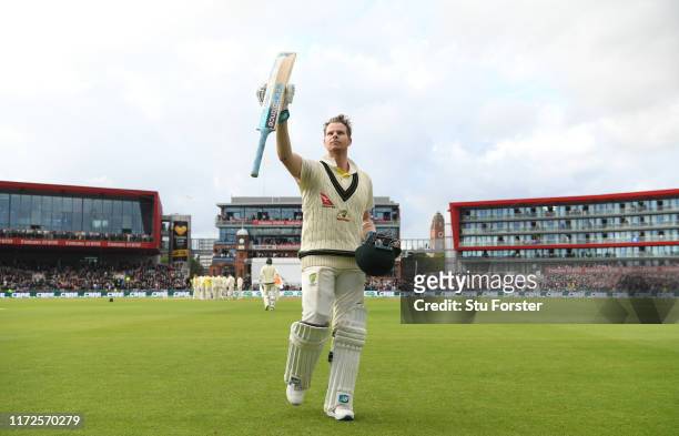 Australia batsman Steve Smith acknowledges the applause whilst leaving the field after being dismissed for 211 runs during day two of the 4th Ashes...