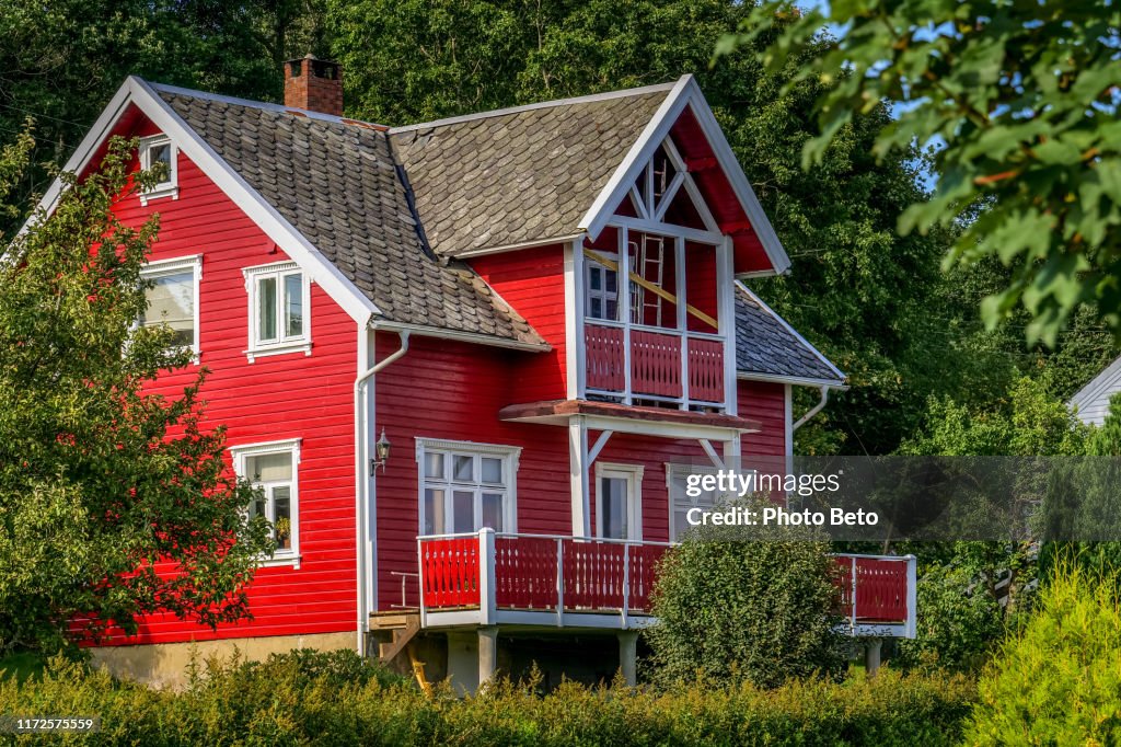 A beautiful typical red wooden house in the Stavanger city region in South Western Norway