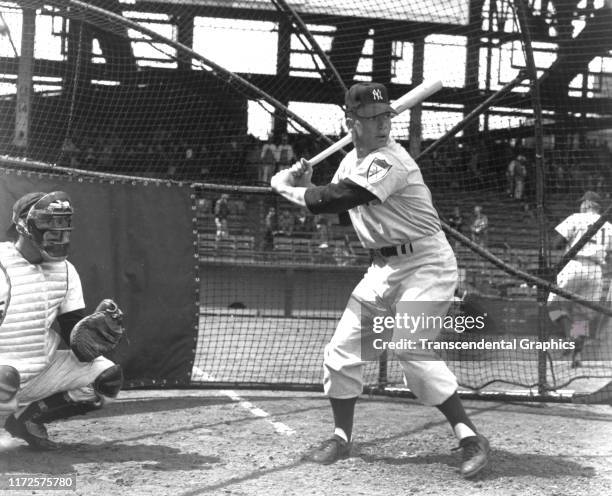 View of American baseball player Mickey Mantle , of the New York Yankees, at bat during spring training, Florida, March 1951.