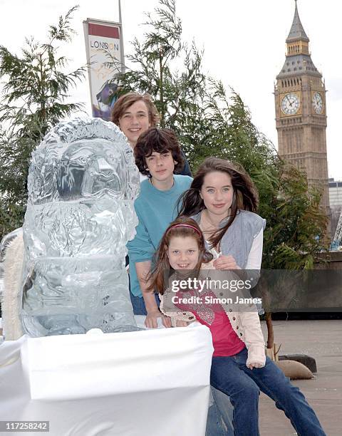 William Moseley, Skandar Keynes, Anna Popplewell and Georgia Henley alongside a lifesize ice sculpture of Aslan.