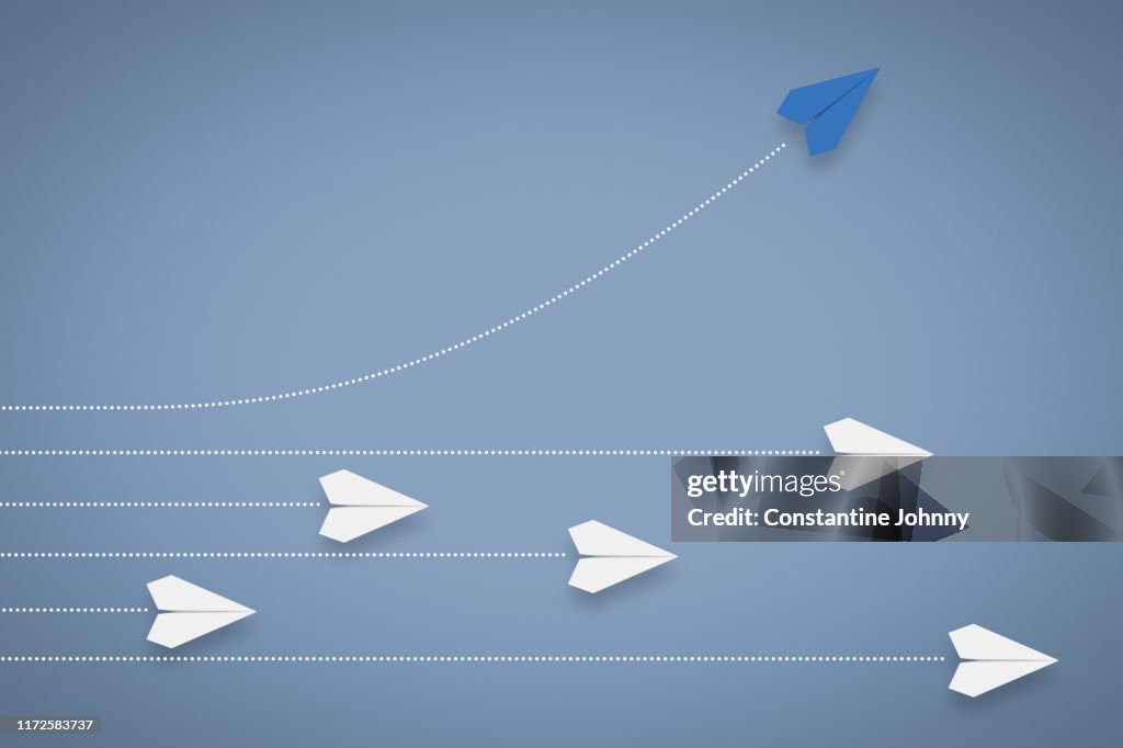 Paper Airplane Different Direction and Approach. Think Different & Leadership Concept.