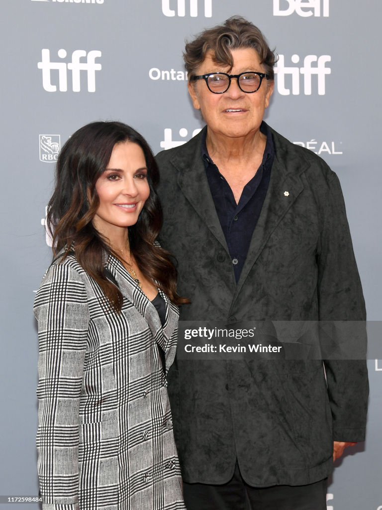 Janet Zuccarini and Robbie Robertson attend the 