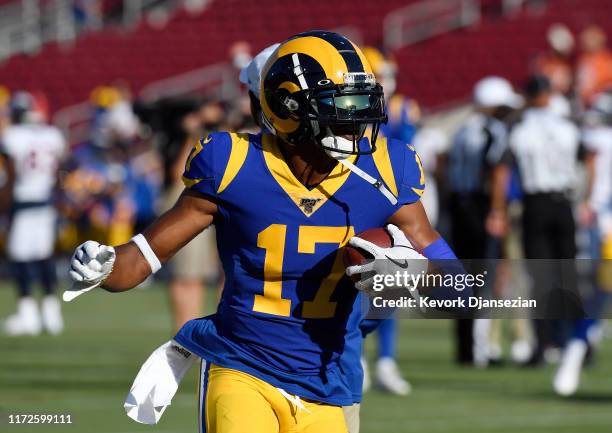 Wide receiver Robert Woods of the Los Angeles Rams catches a pass during pre game warm up for the preseason game against Denver Broncos at Los...