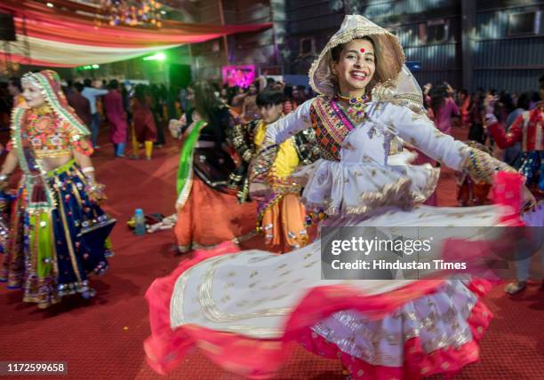 People perform garba on the first day of Navratri Festival at NESCO on September 29, 2019 in Mumbai, India.