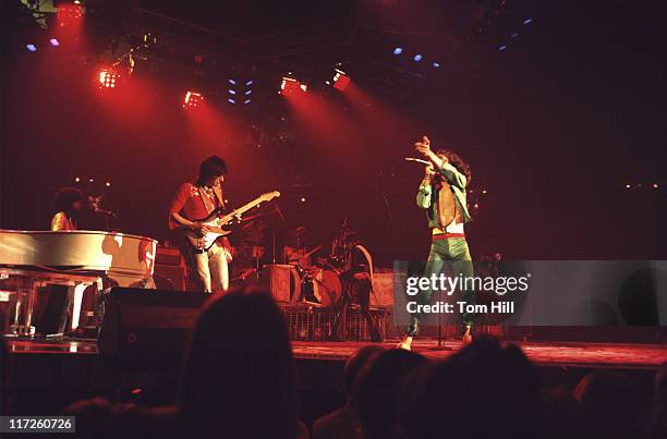 Pianist Billy Preston, guitarists Ron Wood and Keith Richards, singer-frontman Mick Jagger and bassist Bill Wyman perform with The Rolling Stones at...