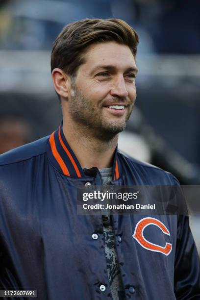 Former Chicago Bears quarterback Jay Cutler looks on before the game between the Green Bay Packers and the Chicago Bears at Soldier Field on...