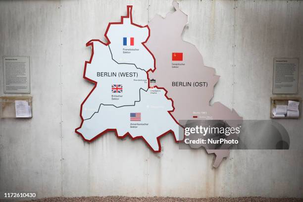 Map of East Berlin and West Berlin at Checkpoint Charlie memorial site in Berlin, Germany on 26th September, 2019. Checkpoint Charlie was the...