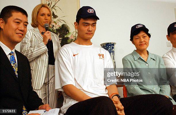 Yao Ming after being chosen first overall in the 2002 NBA Draft on June25, 2002 by the Houston Rockets, Shanghai, China. NOTE TO USER: User expressly...