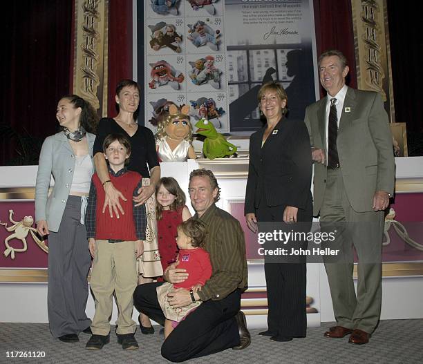 Heather Henson, Dashiell Connery, Lisa Henson, Co-Chief Executive Officer The Jim Henson Company, Ginger Otis, Amelia Henson being lifted up to see...