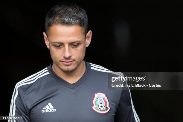 Javier Hernandez of Mexico walks out to the pitch for a training session before the Friendly match between the United States Men's National Team and...