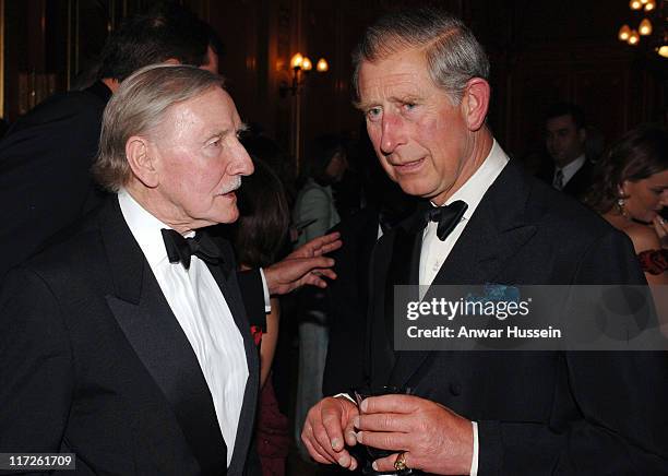 Prince Charles the Prince of Wales, chats to actor Leslie Phillips