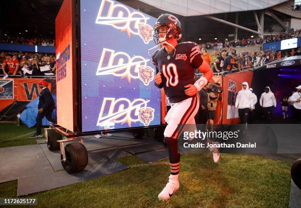 Mitchell Trubisky of the Chicago Bears runs onto the field as he is introduced before the game against the Green Bay Packers at Soldier Field on...
