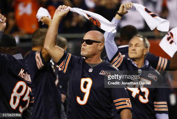 Former Chicago Bears quarterback Jim McMahon and members of the Super Bowl XX Championship Chicago Bears team are honored before the game between the...