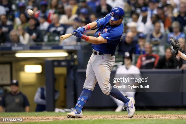 Kyle Schwarber of the Chicago Cubs hits a grand slam in the sixth inning against the Milwaukee Brewers at Miller Park on September 05, 2019 in...