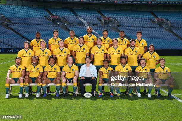 Wallabies players and Mark Gerrard pose for a team photo during the Australian Wallabies Captain's Run at ANZ Stadium on September 06, 2019 in...