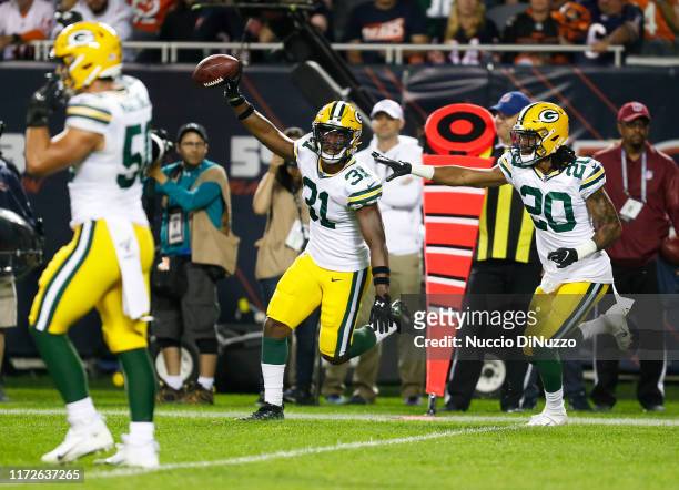 Adrian Amos of the Green Bay Packers celebrates after his interception during the second half against the Chicago Bears at Soldier Field on September...
