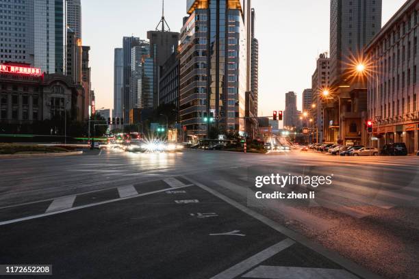 city street at night - street dusk stock pictures, royalty-free photos & images