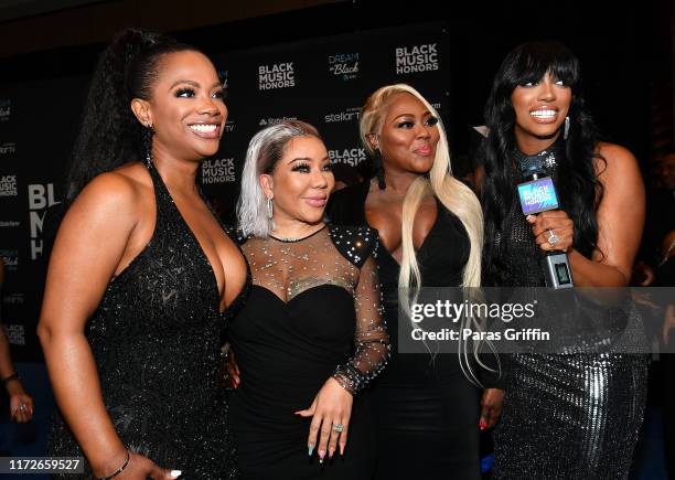 Kandi Burrus, Tameka "Tiny" Harris, LaTocha Scott, and Porsha Williams attend 2019 Black Music Honors at Cobb Energy Performing Arts Centre on...