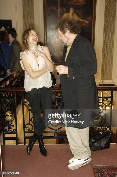 Ieva Imsa and Mike Figgis during Harpers Bazaar Party in London - April 21, 2006 at Dover Street Arts Club in London, Great Britain.