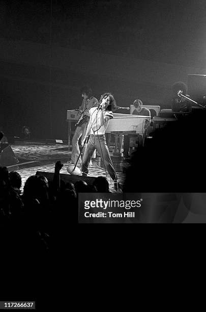Guitarist Ron Wood, singer-frontman Mick Jagger, pianist Ian Stewart and keyboardist Billy Preston perform with The Rolling Stones at the Omni...