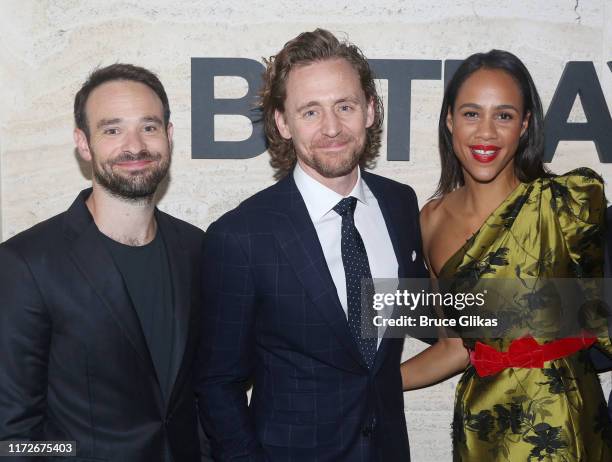 Charlie Cox, Tom Hiddleston, Zawe Ashton pose at The Opening Night Party for "Betrayal" on Broadway at THE POOL at the Seagram Building on September...