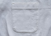 closeup pocket on white cotton shirt