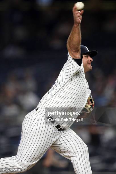 Chance Adams of the New York Yankees pitches during the game between the Cleveland Indians and the New York Yankees at Yankee Stadium on Thursday,...