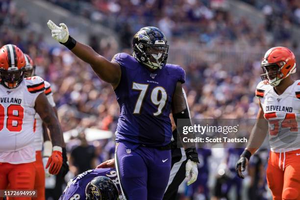 Ronnie Stanley of the Baltimore Ravens gestures after a play against the Cleveland Browns during the first half at M&T Bank Stadium on September 29,...