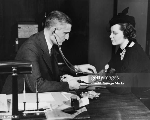 blood pressure - black and white doctor stock pictures, royalty-free photos & images