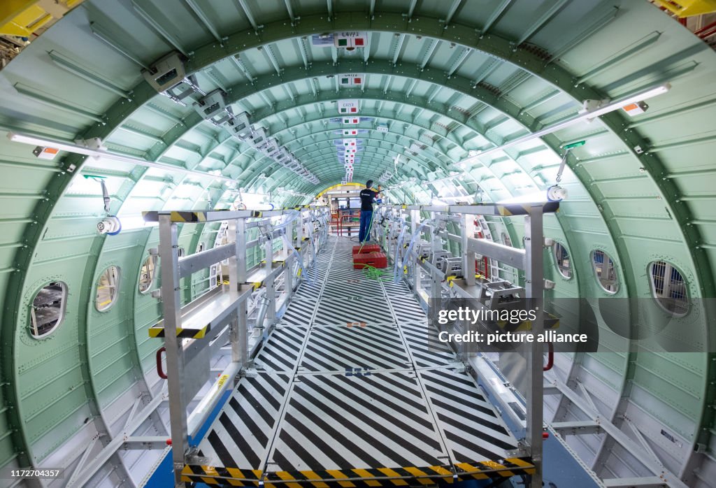 Fuselage System An Airbus technician works in a fuselage segment in the new... News ...