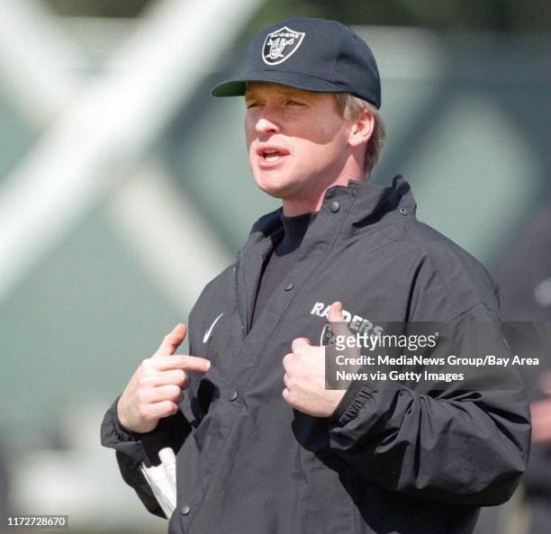 Oakland Raiders new head coach Jon Gruden gives instruction during a mini camp practice session in Alameda friday morning.