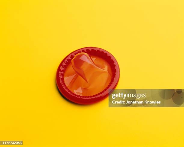 red condom - condom bildbanksfoton och bilder