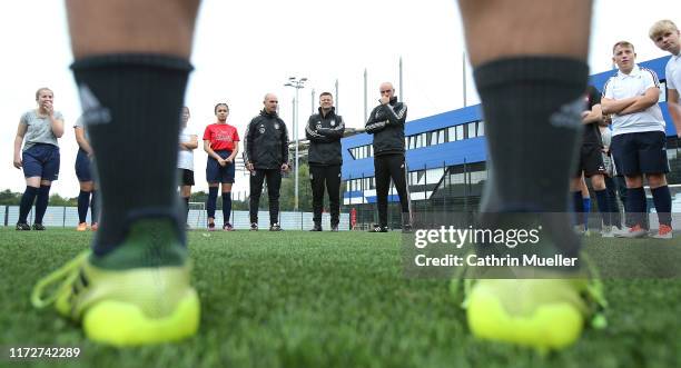 Marc Meister, Christian Woerns and Heiko Westermann run a training session with junior coaches during an DFB Junior Coach Event at the HSV Campus on...