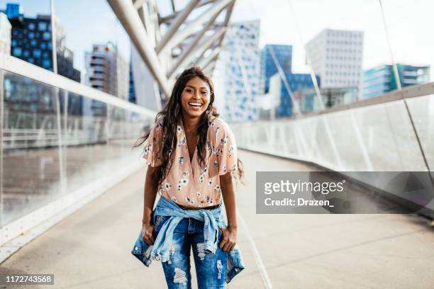 portrait of beautiful indian or south-east asian millennial woman in downtown - summer norway people stock pictures, royalty-free photos & images
