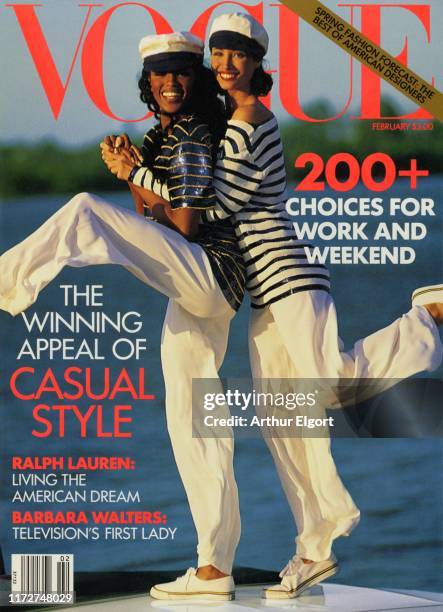 Vogue, February 1992 - Models Naomi Campbell and Christy Turlington in sequined t-shirts and silk white pants by Ralph Lauren.