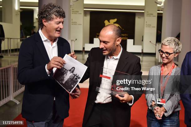 Angelo Quarti, Piergiorgio Pirrone and Alessandra Vitali director of the festival Alberto Barbera walk the red carpet ahead of the "La Mafia Non E...